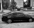 Чорний Кіа Оптіма, об'ємом двигуна 2.4 л та пробігом 170 тис. км за 8900 $, фото 1 на Automoto.ua