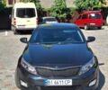 Черный Киа Оптима, объемом двигателя 2.4 л и пробегом 175 тыс. км за 10300 $, фото 1 на Automoto.ua