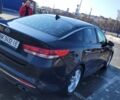 Черный Киа Оптима, объемом двигателя 2 л и пробегом 248 тыс. км за 12292 $, фото 1 на Automoto.ua
