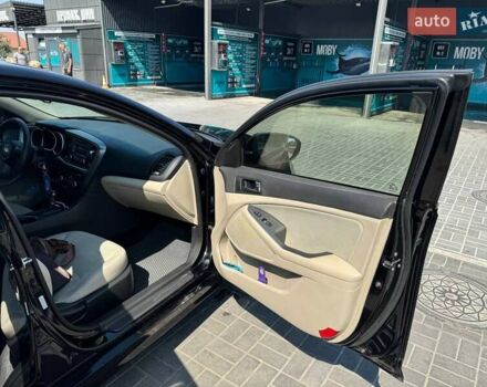 Черный Киа Оптима, объемом двигателя 2.36 л и пробегом 84 тыс. км за 11300 $, фото 5 на Automoto.ua