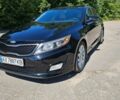 Черный Киа Оптима, объемом двигателя 2.4 л и пробегом 250 тыс. км за 8300 $, фото 1 на Automoto.ua