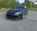 Чорний Кіа Оптіма, об'ємом двигуна 2 л та пробігом 167 тис. км за 12900 $, фото 1 на Automoto.ua