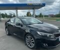 Чорний Кіа Оптіма, об'ємом двигуна 1.69 л та пробігом 320 тис. км за 12000 $, фото 1 на Automoto.ua