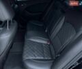 Черный Киа Оптима, объемом двигателя 2 л и пробегом 138 тыс. км за 10000 $, фото 13 на Automoto.ua