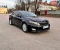 Черный Киа Оптима, объемом двигателя 2.4 л и пробегом 250 тыс. км за 8900 $, фото 1 на Automoto.ua