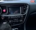Черный Киа Оптима, объемом двигателя 2 л и пробегом 138 тыс. км за 10000 $, фото 14 на Automoto.ua