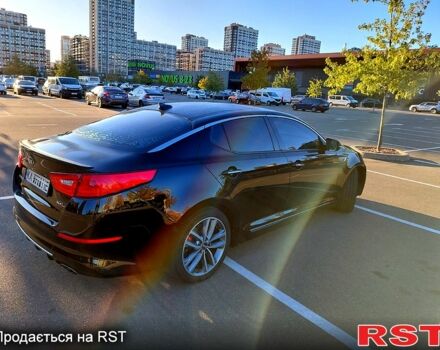 Чорний Кіа Оптіма, об'ємом двигуна 2 л та пробігом 155 тис. км за 15200 $, фото 1 на Automoto.ua