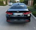 Чорний Кіа Оптіма, об'ємом двигуна 2.36 л та пробігом 155 тис. км за 9299 $, фото 13 на Automoto.ua