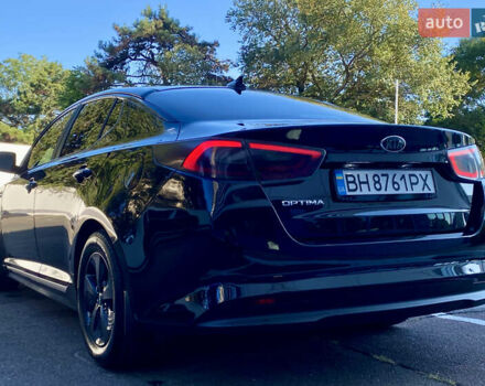 Черный Киа Оптима, объемом двигателя 2.36 л и пробегом 171 тыс. км за 13000 $, фото 3 на Automoto.ua