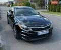Черный Киа Оптима, объемом двигателя 2.36 л и пробегом 155 тыс. км за 10750 $, фото 1 на Automoto.ua
