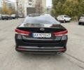 Черный Киа Оптима, объемом двигателя 2 л и пробегом 318 тыс. км за 10800 $, фото 4 на Automoto.ua