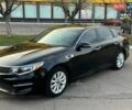 Черный Киа Оптима, объемом двигателя 2.36 л и пробегом 124 тыс. км за 11300 $, фото 1 на Automoto.ua