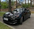 Черный Киа Оптима, объемом двигателя 2.36 л и пробегом 131 тыс. км за 10000 $, фото 1 на Automoto.ua