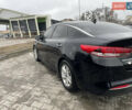 Черный Киа Оптима, объемом двигателя 2.4 л и пробегом 186 тыс. км за 9500 $, фото 4 на Automoto.ua