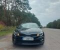 Черный Киа Оптима, объемом двигателя 2.36 л и пробегом 122 тыс. км за 10200 $, фото 1 на Automoto.ua