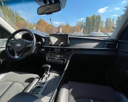 Чорний Кіа Оптіма, об'ємом двигуна 1.7 л та пробігом 128 тис. км за 13500 $, фото 11 на Automoto.ua
