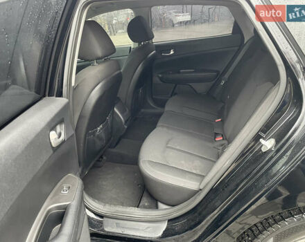 Черный Киа Оптима, объемом двигателя 2.4 л и пробегом 186 тыс. км за 9500 $, фото 6 на Automoto.ua