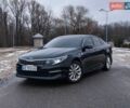 Черный Киа Оптима, объемом двигателя 2.4 л и пробегом 90 тыс. км за 12300 $, фото 1 на Automoto.ua