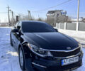 Черный Киа Оптима, объемом двигателя 2.36 л и пробегом 236 тыс. км за 10500 $, фото 1 на Automoto.ua