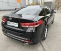 Черный Киа Оптима, объемом двигателя 2 л и пробегом 318 тыс. км за 10800 $, фото 3 на Automoto.ua