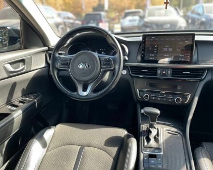 Чорний Кіа Оптіма, об'ємом двигуна 1.7 л та пробігом 128 тис. км за 13500 $, фото 16 на Automoto.ua