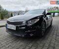 Черный Киа Оптима, объемом двигателя 2.36 л и пробегом 180 тыс. км за 9500 $, фото 2 на Automoto.ua