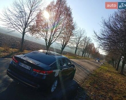 Черный Киа Оптима, объемом двигателя 2.36 л и пробегом 262 тыс. км за 9600 $, фото 1 на Automoto.ua