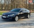 Черный Киа Оптима, объемом двигателя 2.36 л и пробегом 138 тыс. км за 10500 $, фото 1 на Automoto.ua