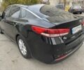 Черный Киа Оптима, объемом двигателя 2 л и пробегом 318 тыс. км за 10800 $, фото 5 на Automoto.ua