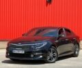 Чорний Кіа Оптіма, об'ємом двигуна 2 л та пробігом 140 тис. км за 15999 $, фото 1 на Automoto.ua