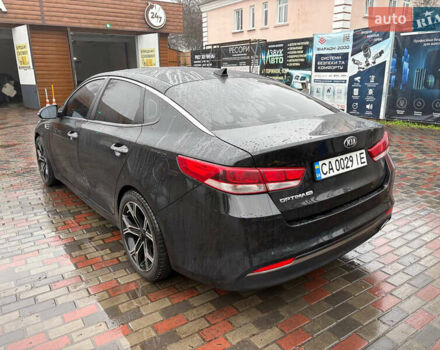 Черный Киа Оптима, объемом двигателя 2.4 л и пробегом 137 тыс. км за 11000 $, фото 3 на Automoto.ua