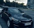 Черный Киа Оптима, объемом двигателя 2.36 л и пробегом 209 тыс. км за 11200 $, фото 1 на Automoto.ua
