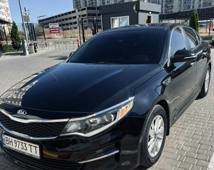 Черный Киа Оптима, объемом двигателя 2.4 л и пробегом 144 тыс. км за 10300 $, фото 1 на Automoto.ua