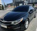 Черный Киа Оптима, объемом двигателя 2.4 л и пробегом 144 тыс. км за 10300 $, фото 1 на Automoto.ua
