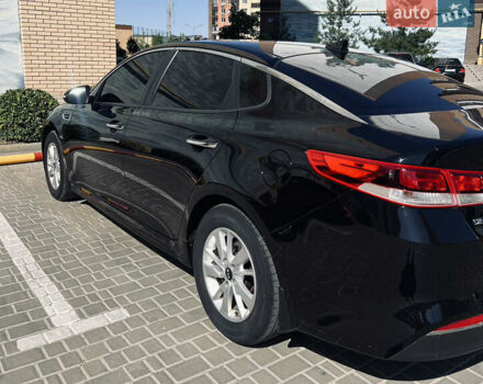 Черный Киа Оптима, объемом двигателя 2.4 л и пробегом 144 тыс. км за 10300 $, фото 3 на Automoto.ua