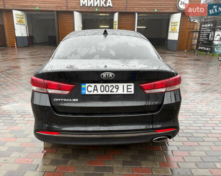 Черный Киа Оптима, объемом двигателя 2.4 л и пробегом 137 тыс. км за 11000 $, фото 5 на Automoto.ua