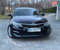 Черный Киа Оптима, объемом двигателя 2.4 л и пробегом 165 тыс. км за 9300 $, фото 4 на Automoto.ua