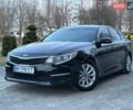 Черный Киа Оптима, объемом двигателя 2.4 л и пробегом 165 тыс. км за 9300 $, фото 1 на Automoto.ua