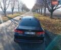 Черный Киа Оптима, объемом двигателя 2.36 л и пробегом 262 тыс. км за 9600 $, фото 2 на Automoto.ua