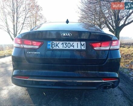 Черный Киа Оптима, объемом двигателя 2.36 л и пробегом 262 тыс. км за 9600 $, фото 3 на Automoto.ua