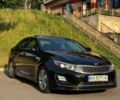 Черный Киа Оптима, объемом двигателя 2.4 л и пробегом 140 тыс. км за 13000 $, фото 1 на Automoto.ua