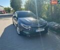 Черный Киа Оптима, объемом двигателя 2.36 л и пробегом 110 тыс. км за 10700 $, фото 4 на Automoto.ua