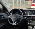 Чорний Кіа Оптіма, об'ємом двигуна 2 л та пробігом 214 тис. км за 11700 $, фото 11 на Automoto.ua