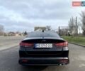 Чорний Кіа Оптіма, об'ємом двигуна 2.36 л та пробігом 186 тис. км за 10500 $, фото 6 на Automoto.ua