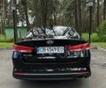 Черный Киа Оптима, объемом двигателя 2.36 л и пробегом 131 тыс. км за 10000 $, фото 3 на Automoto.ua