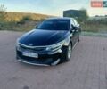 Чорний Кіа Оптіма, об'ємом двигуна 2 л та пробігом 232 тис. км за 13500 $, фото 1 на Automoto.ua