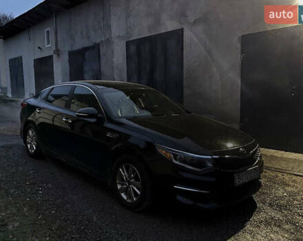 Черный Киа Оптима, объемом двигателя 2.36 л и пробегом 110 тыс. км за 10400 $, фото 1 на Automoto.ua