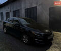 Черный Киа Оптима, объемом двигателя 2.36 л и пробегом 110 тыс. км за 10400 $, фото 1 на Automoto.ua