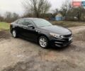 Черный Киа Оптима, объемом двигателя 2.36 л и пробегом 132 тыс. км за 10800 $, фото 1 на Automoto.ua