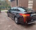 Черный Киа Оптима, объемом двигателя 2 л и пробегом 94 тыс. км за 330 $, фото 4 на Automoto.ua